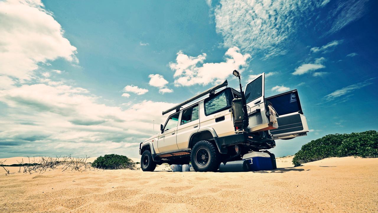 4WD vehicle at beach generic.