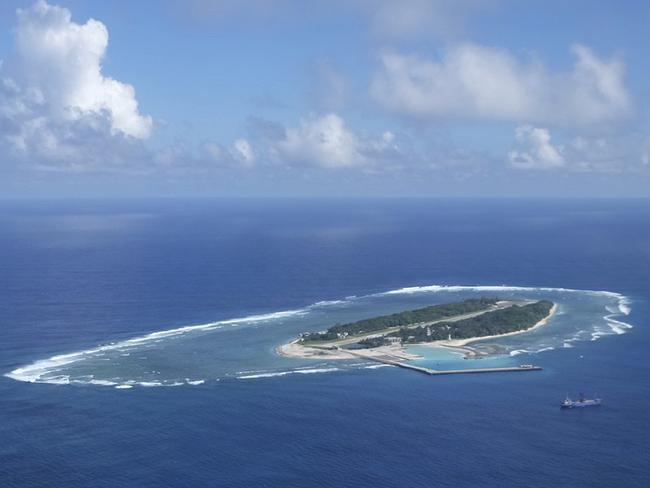 An aerial view shows a vessel preparing for a search-and-rescue exercise off Taiping island, in the South China Sea.