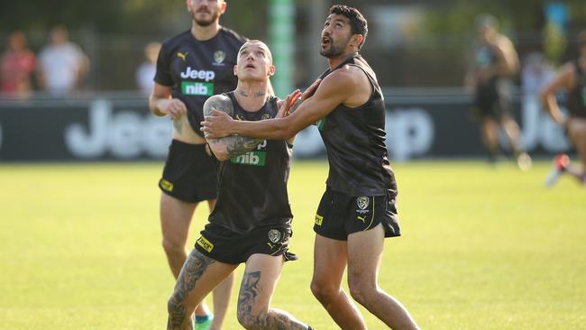 Dustin Martin, left, and Marlion Pickett compete at Richmond training in December. Picture: Mike Owen/AFL Photos