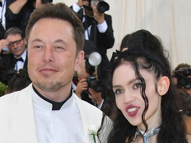 NEW YORK, NY - MAY 07:  Elon Musk and Grimes attend the Heavenly Bodies: Fashion & The Catholic Imagination Costume Institute Gala at The Metropolitan Museum of Art on May 7, 2018 in New York City.  (Photo by Neilson Barnard/Getty Images)