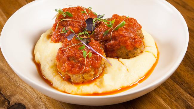 Another of Meatball and Wine Bar’s meatballs served on mash topped with red sauce.