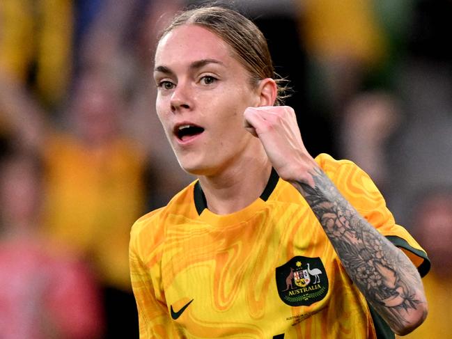 Australia's Sharn Freier celebrates scoring a goal during the women's international football friendly between Australia and Taiwan at the Rectangular Stadium in Melbourne on December 4, 2024. (Photo by William WEST / AFP) / --IMAGE RESTRICTED TO EDITORIAL USE - STRICTLY NO COMMERCIAL USE--