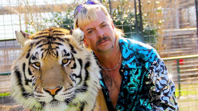 "Joe Exotic" Maldonado-Passage with one of his tigers. Picture: AFP.