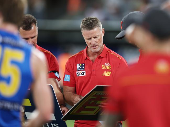 Damien Hardwick works the magnets during a pre-season game. Picture: Matt King/Getty Images