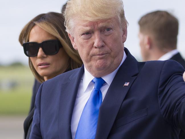 President Donald Trump, with first lady Melania Trump, points as they arrive at Shannon Airport, Thursday, June 6, 2019, in Shannon, Ireland. (AP Photo/Alex Brandon)