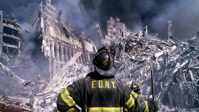 Firefighter surveys remains of World Trade Centre in New York