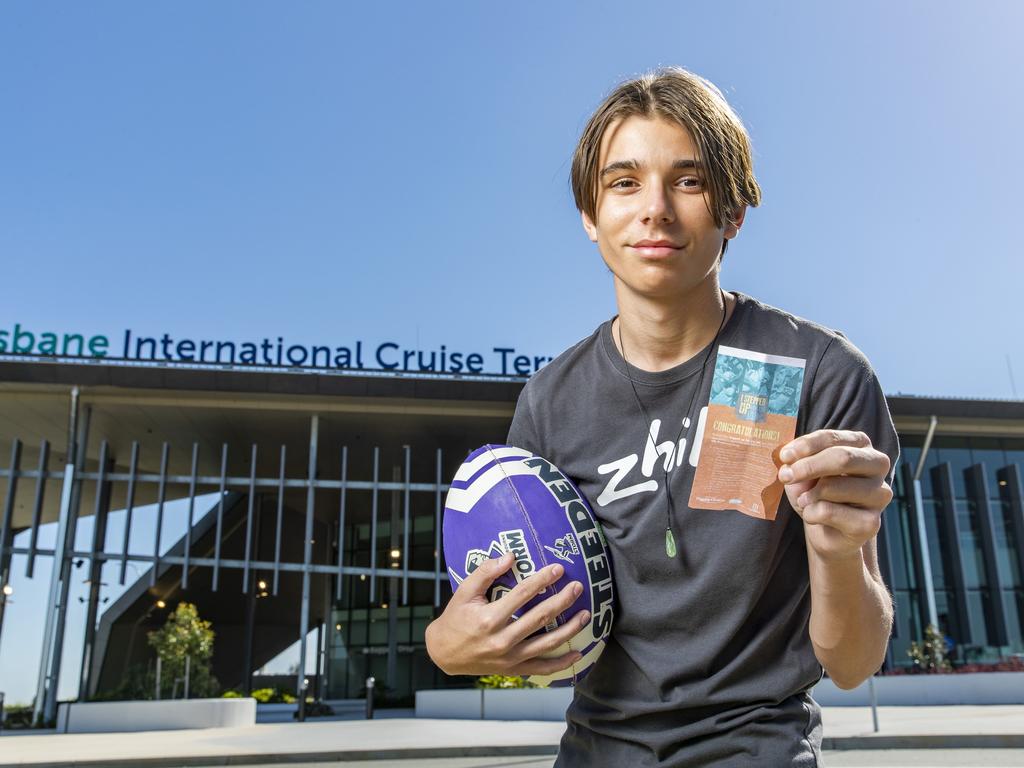 Jai Edmunds is the first person to be vaccinated at the Pinkenba COVID Vaccination Hub at Brisbane International Cruise Terminal and received a free NRL finals ticket. Picture: Richard Walker