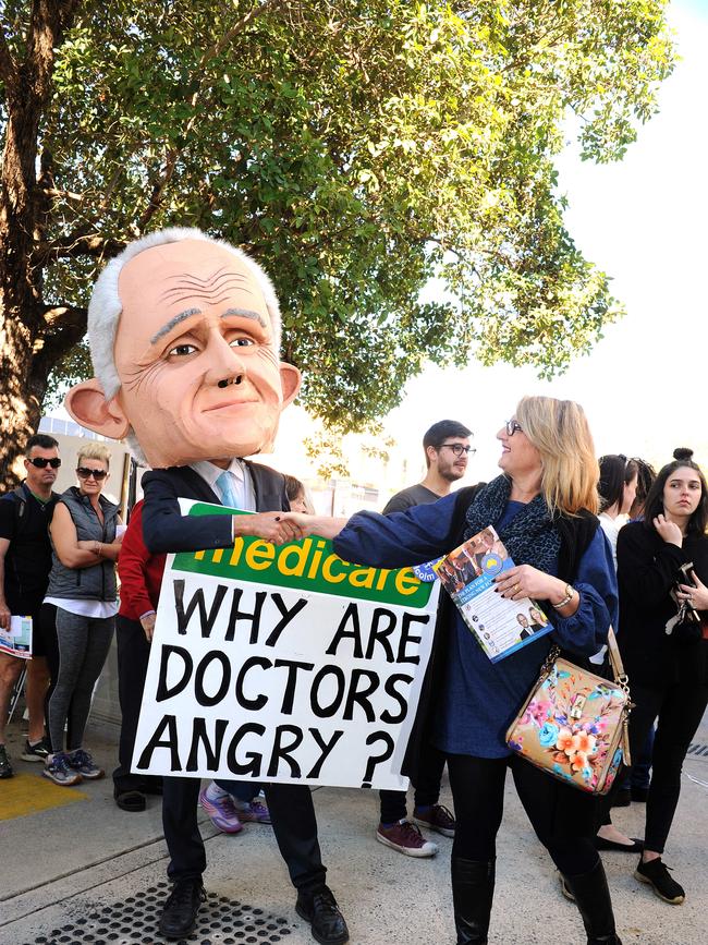 West End State School, Catie Tighe talks to a Malcolm Turnbull look a like. Action around the booths. Picture: John Gass