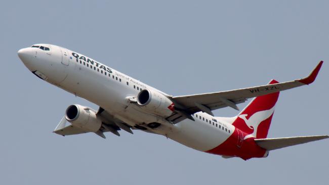 QANTAS plane departing from Brisbane Airport Pictures David Clark Photography