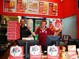 Pizza Hut franchisee Andrew Hamilton and Matthew Dugmore are all ready for Origin fever. Picture: Scottie Simonds