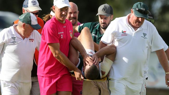 Sam Reid had to be carted off during his Echuca Murray debut. Picture: Yuri Kouzmin