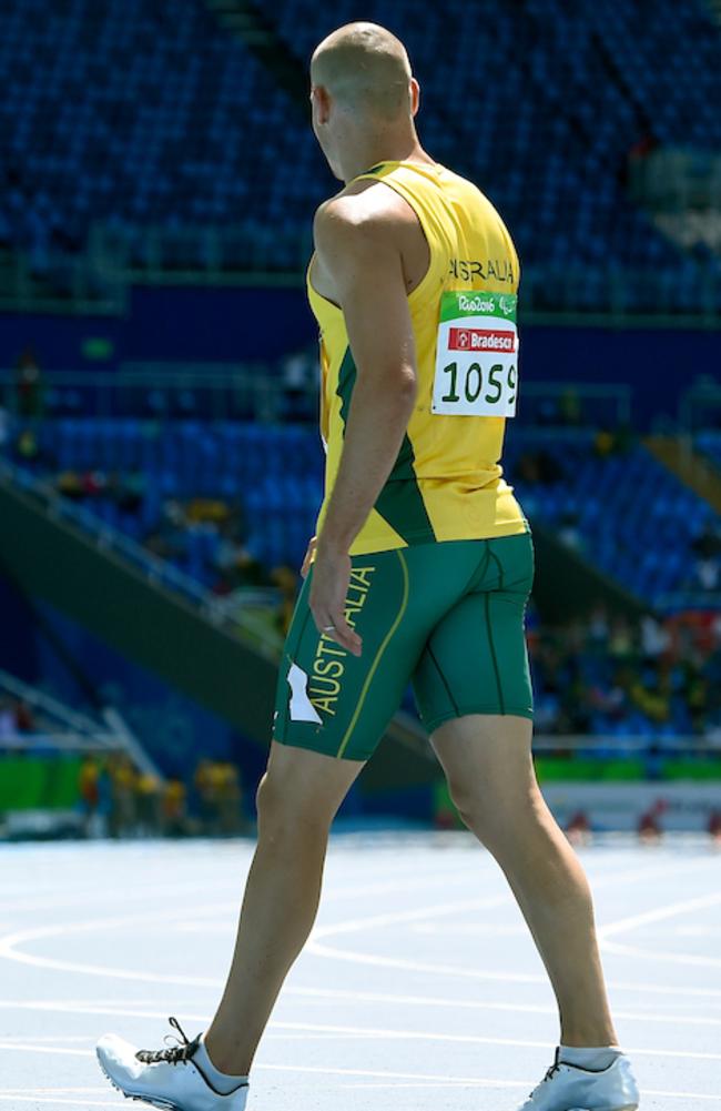 A stunned Evan O'Hanlon walks from the track after his second placing.