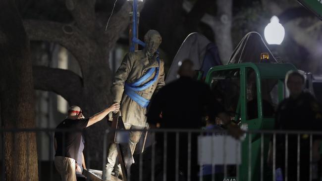 A statue of Confederate Gen. Robert E. Lee is removed from the University of Texas campus in Austin, Texas.