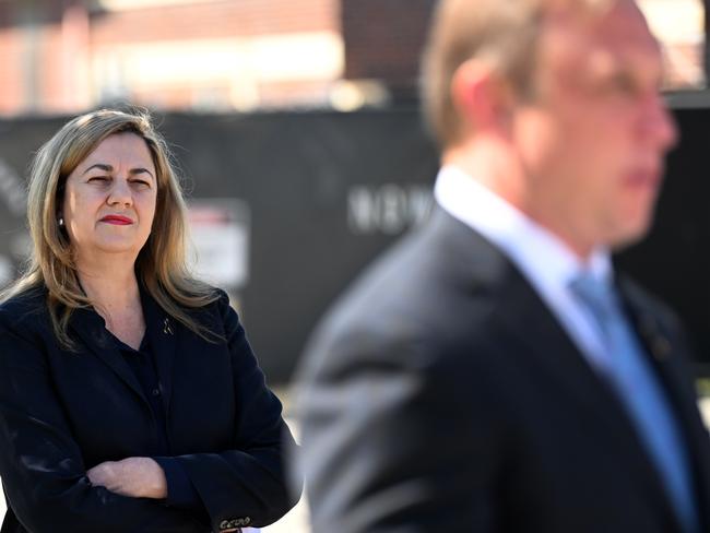 BRISBANE, AUSTRALIA - NewsWire Photos - SEPTEMBER 13, 2022.Queensland Premier Annastacia Palaszczuk listens to Deputy Premier Steven Miles as he speaks during a press conference at a construction site in Yeerongpilly, on Brisbane's Southside. The Government will stage a Housing Summit to address the urgency around multiple housing issues, beginning this Friday with an initial roundtable of key government and non-government stakeholders.Picture: NCA NewsWire / Dan Peled