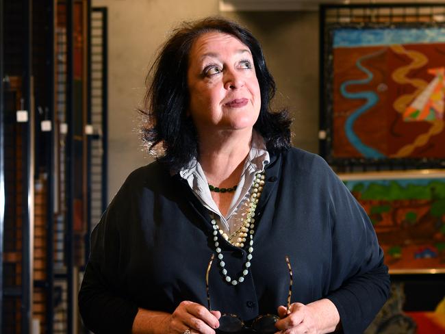 Radio host Wendy Harmer look at artworks in the archive at Casula Powerhouse in Casula, Sydney, Wednesday, Sept. 13, 2017. Harmer is selecting works for her upcoming CPAC exhibition. (AAP Image/Joel Carrett)