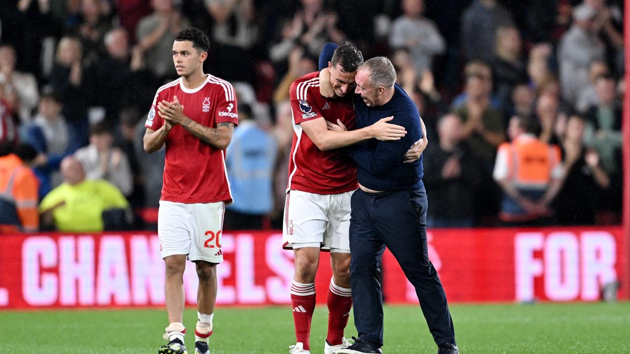 NOTTINGHAM, ENGLAND – AUGUST 18: Chris Wood of Nottingham Forest celebrates with his manager, Steve Cooper, after the team's victory in the Premier League match between Nottingham Forest and Sheffield United at City Ground on August 18, 2023 in Nottingham, England. (Photo by Michael Regan/Getty Images)