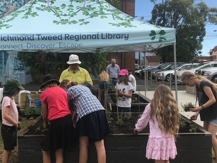 PIZZA GARDEN: Horticulturalist Tony and the Lismore Garden Centre shows youngsters how to tend their pizza garden in the Quad.