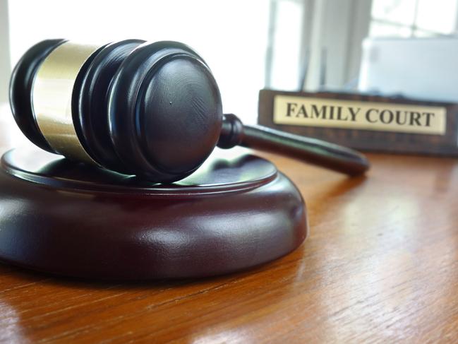 Judge's legal gavel on a desk with Family Court nameplate in the background Picture: Istock