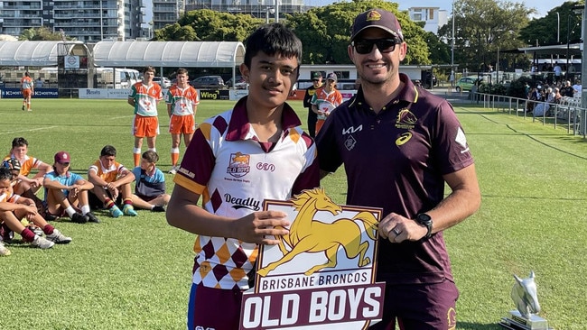 The 2022 Broncos Old Boys Trophy final man of the match, Rarne Neemia, (Wavell SHS) with the great Matt Gillett.