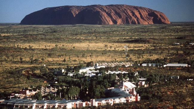 Aerial view of Sails in the Desert, part of Ayers Rock Resort at Yulara in Uluru national park with Ayers Rock in background. Pic NT Tourism Commision. Northern Territory (NT) / Hotel / National Parks Travel