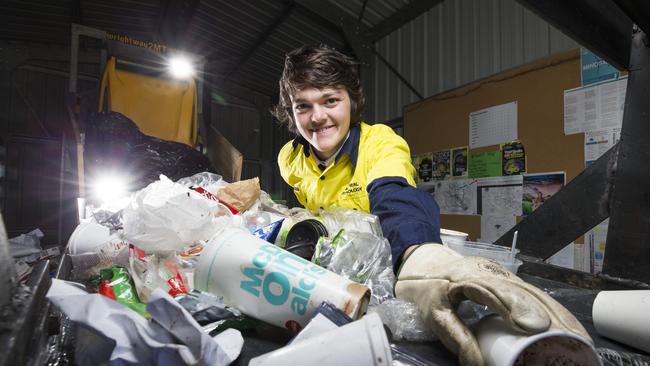 The war on waste has gripped the nation. Zain Stephens sorts through the rubbish at his school. Pic: AAP Image/Renae Droop