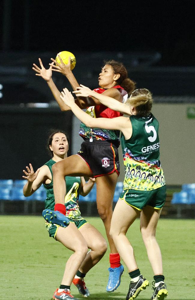 Jennifer Wren takes a mark in the AFL Cairns Women's representative game between the Cairns All Stars and the Indigenous South Pacific All Stars, held at Cazalys Stadium. Picture: Brendan Radke