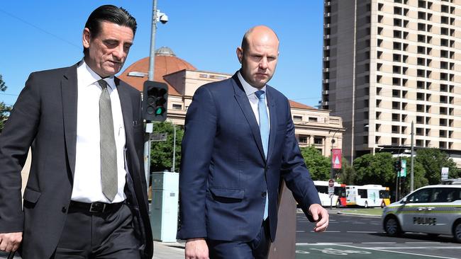 Independent MP Sam Duluk, right, and his solicitor Domenic Agresta, left, outside court. Picture: NCA Newswire/Dean Martin