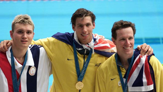 Grant Hackett wins gold at the Sydney Olympics. Pictured with silver medallist Kieren Perkins and Chjris Thomson from the USA. Picture: Craig Borrow