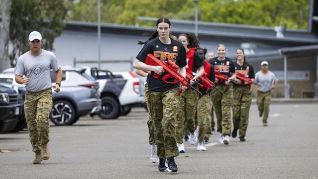 Players from Townsville Fire Basketball team visit Lavarack Barracks to do team bonding through different army training scenarios run by the PTI's at Townsville, Queensland.