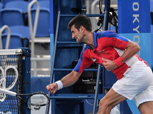 Djokovic lost his cool in the medal match. (Photo by Tiziana Fabi / AFP).