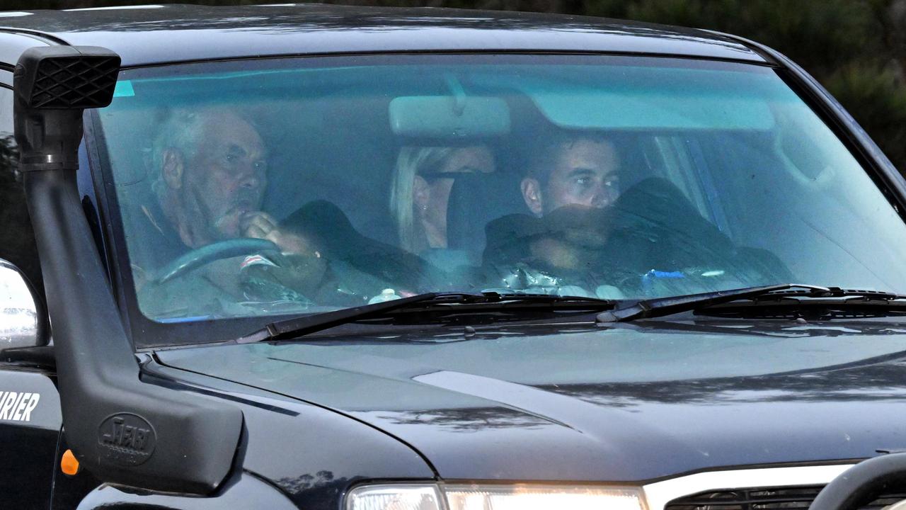 Family members arrive at a rural property on Jerrara Rd, Bungonia in the Southern Tablelands, 170km southwest of Sydney. Picture: AAP