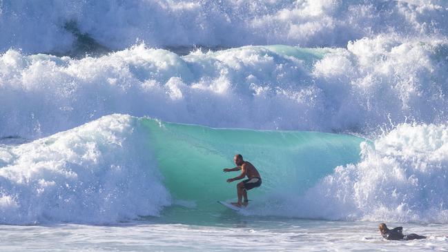 The Bureau of Meteorology’s Angus Hines said “very, very large waves” up to 7m were forecast on Wednesday . Photo Jeremy Piper