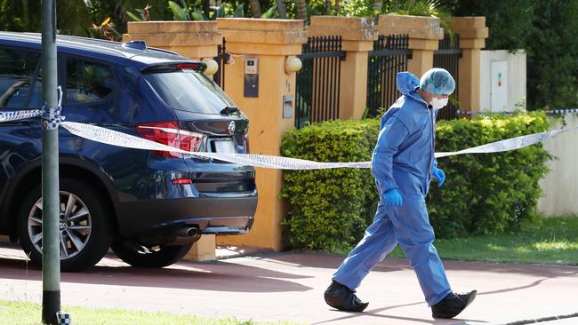 Forensic police at the scene of the fatal shooting at Delfin Drive, MacGregor. Photographer: Liam Kidston.