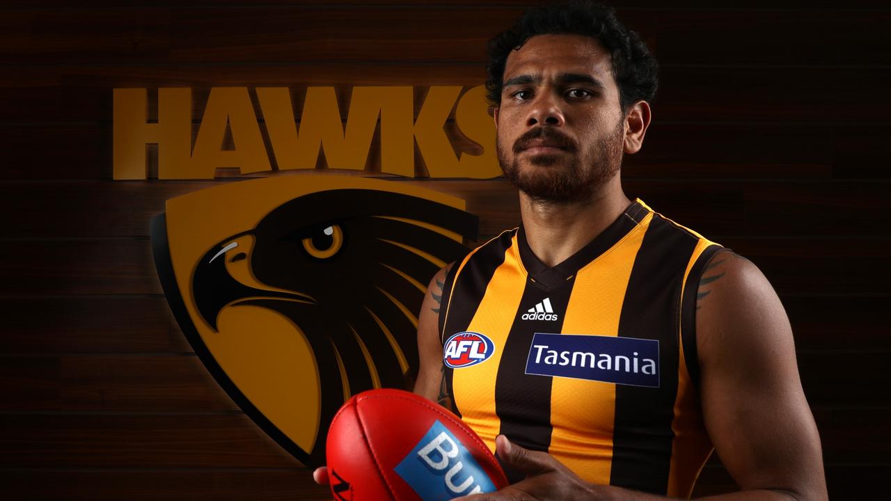 MELBOURNE, AUSTRALIA - JANUARY 23: Cyril Rioli of the Hawks poses for a portrait during the Hawthorn Hawks team photo day at the Ricoh Centre on January 23, 2018 in Melbourne, Australia. (Photo by Robert Cianflone/AFL Media)