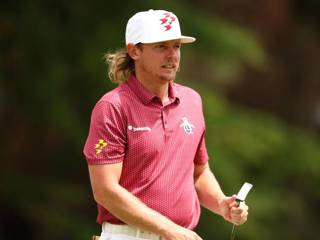 MELBOURNE, AUSTRALIA - DECEMBER 01: Cameron Smith of Australia walks on the 17th green on day four of the ISPS Handa Australian Open 2024 at Kingston Heath Golf Club on December 01, 2024 in Melbourne, Australia. (Photo by Morgan Hancock/Getty Images)