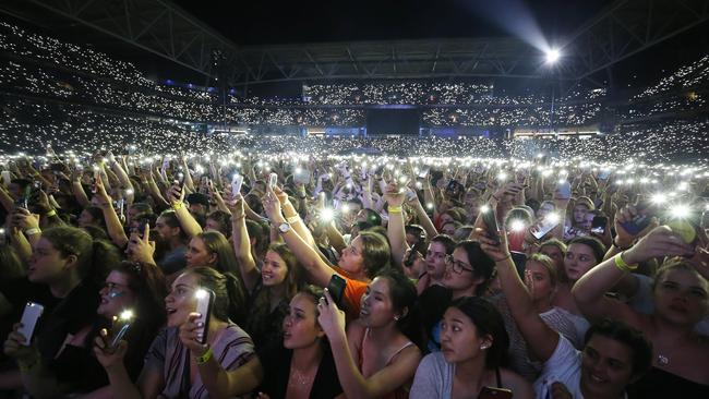 Fans heading home by train from Ed Sheeran’s concert at Suncorp Stadium have been hit by delays of up to 60 minutes. Picture: AAP/Josh Woning