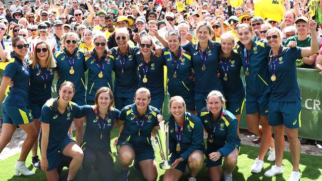 The Australian team celebrate at a fan day at Federation Square in Melbourne on Monday. Picture: Getty Images