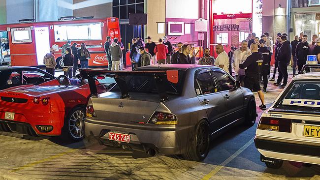 Local petrolheads mingle with law enforcement at CheesestEak and Cars. Photo credit: Bronwyn Holmes, Chequered Photography