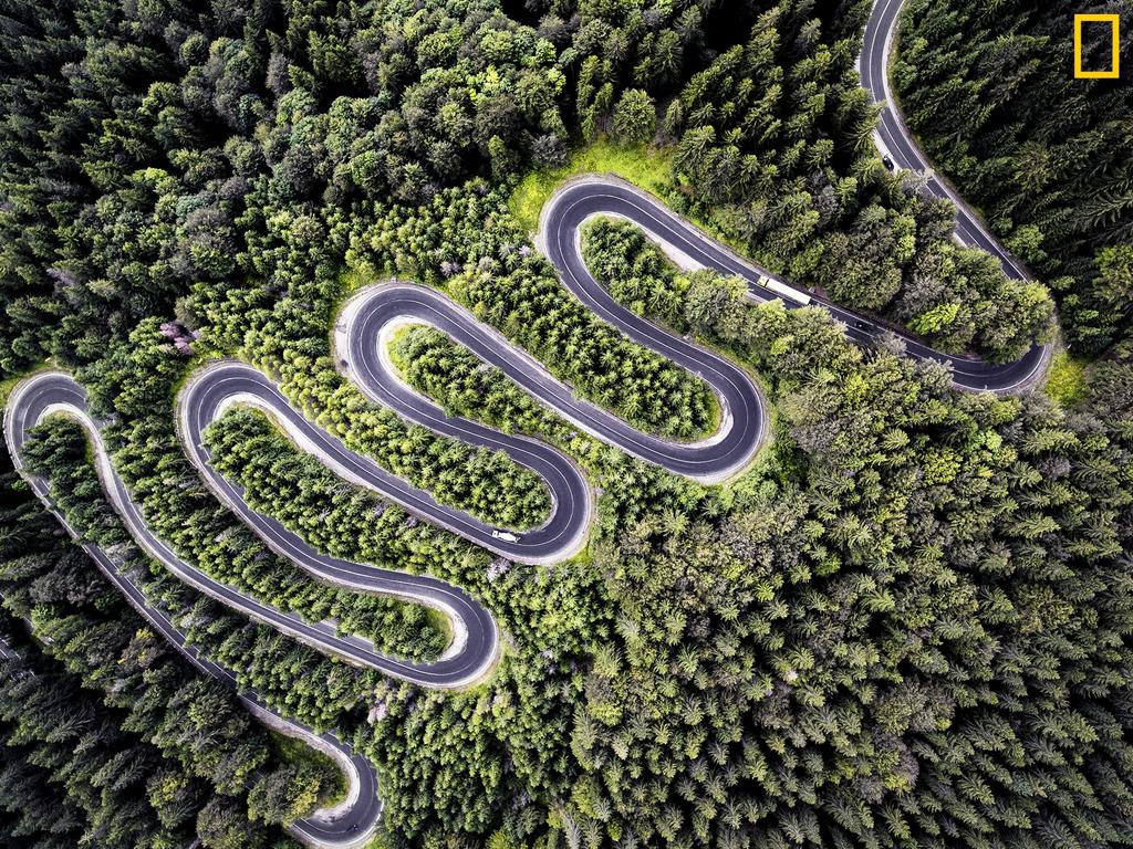 Photo by Calin Stan / National Geographic Nature Photographer of the Year contest Infinite Road to Transylvania This is Cheia (DN1A) road that takes you to Transylvania. Yes, THAT Transylvania, the birthplace of the legendary Count Dracula (Vlad Tepes). The legend says that this shot imagines what he might have seen on his nocturnal flights! Nevertheless, it’s a breathtaking view with a magnificent road.