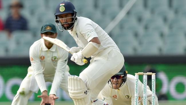 Cheteshwar Pujara gives a Test batting masterclass against Australia. Picture: AFP