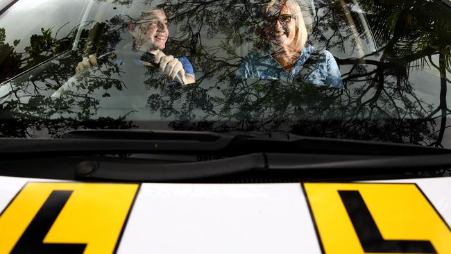 Teenager Amit Levin with driving instructor Maya Jansen. Picture: Adam Head