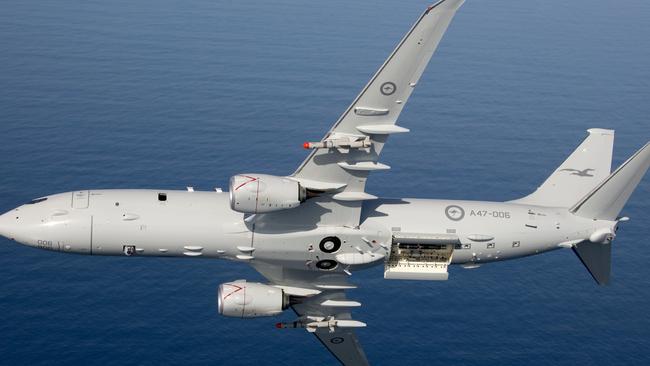 Air to Air photo of Royal Australian Air Force P-8A Poseidon with Harpoon Missiles. *** Local Caption *** Air to Air photo of Royal Australian Air Force P-8A Poseidon with Harpoon Missiles.