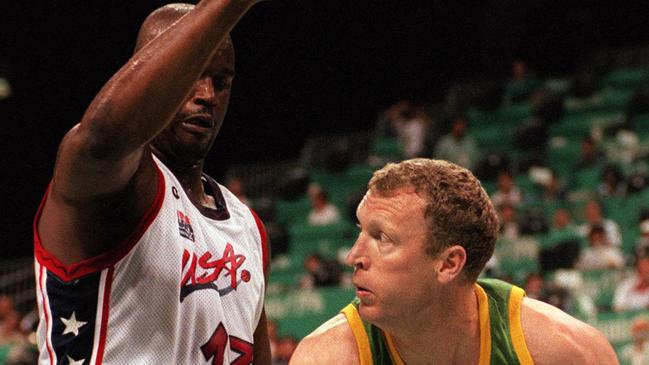 Ray Borner trying to get past USA basketballer Shaquille O'Neal at the 1996 Olympic Games. Picture: Craig Borrow.