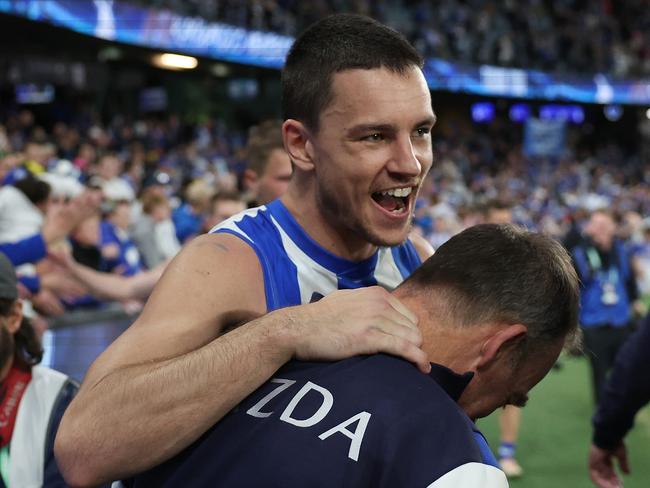 MELBOURNE, AUSTRALIA - AUGUST 03: Luke Davies-Uniacke of the Kangaroos celebrate with Alastair Clarkson, Senior Coach of the Kangaroos after winning the round 21 AFL match between North Melbourne Kangaroos and Richmond Tigers at Marvel Stadium, on August 03, 2024, in Melbourne, Australia. (Photo by Daniel Pockett/Getty Images)