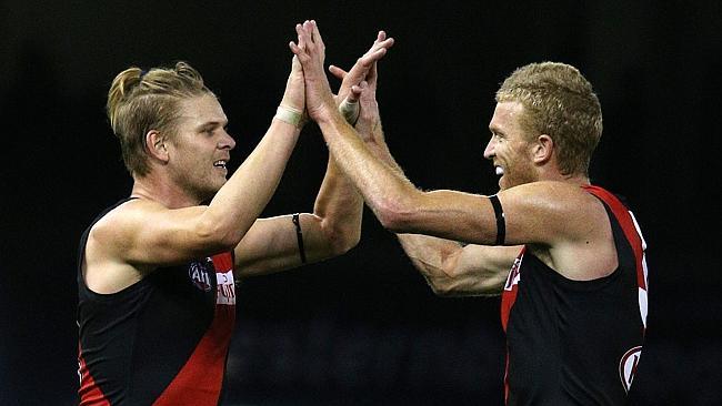 Essendon&#39;s Michael Hurley opays homage to veteran teammate Dustin Fletcher after the win.