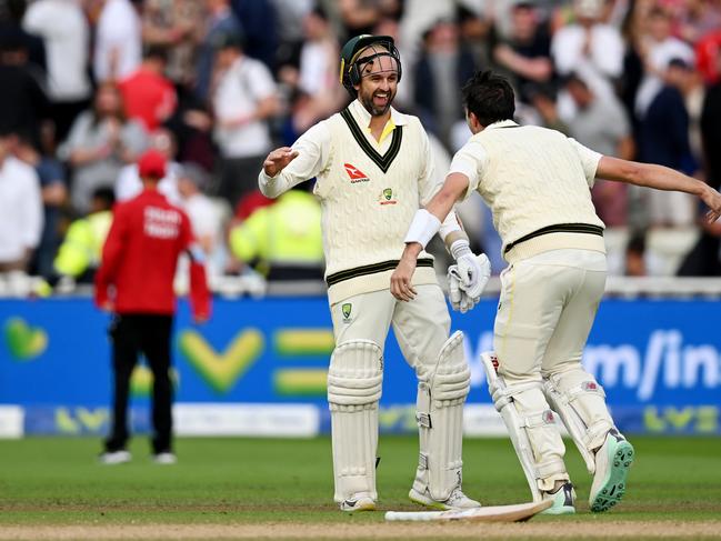 BIRMINGHAM, ENGLAND - JUNE 20: Pat Cummins of Australia celebrates after hitting the winning runs to defeat England with teammate Nathan Lyon during Day Five of the LV= Insurance Ashes 1st Test match between England and Australia at Edgbaston on June 20, 2023 in Birmingham, England. (Photo by Shaun Botterill/Getty Images)