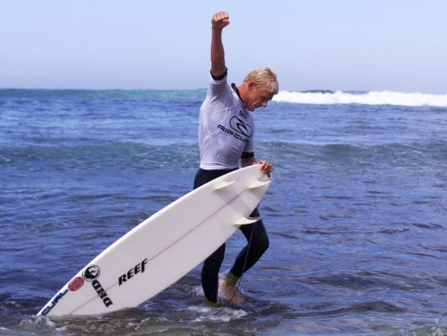 Wildcard Mick Fanning celebrates his first win at Bells. Picture: Pierre Tostee/ASP