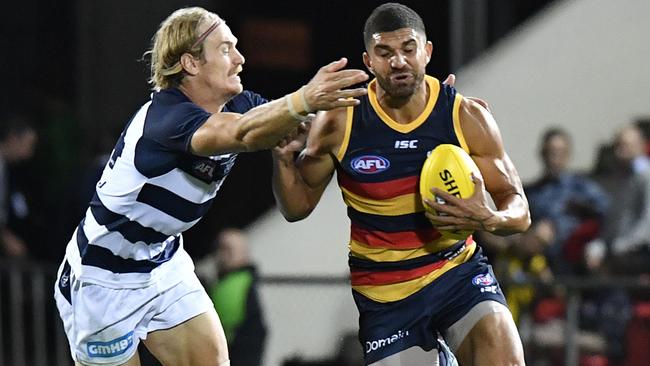 Adelaide’s Curtly Hampton takes on Tom Stewart in the AFLX grand final.