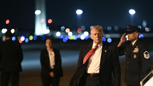 US President Donald Trump steps off Air Force One as he arrives at Palm Beach International Airport. Picture: Brendan Smialowski/AFP