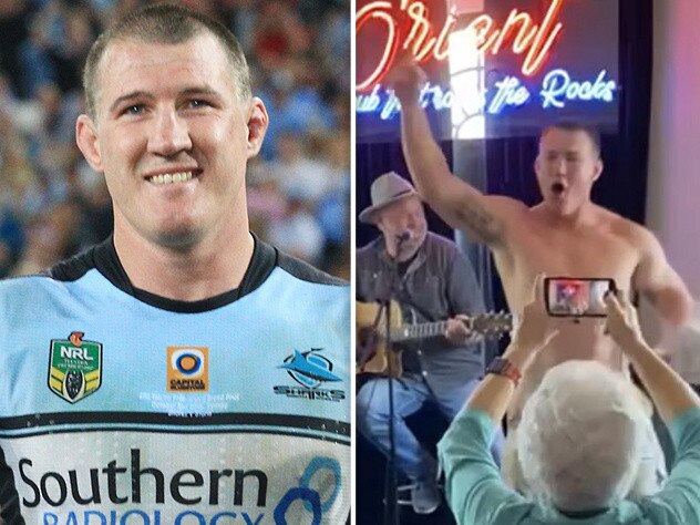 Paul Gallen dancing at a pub.